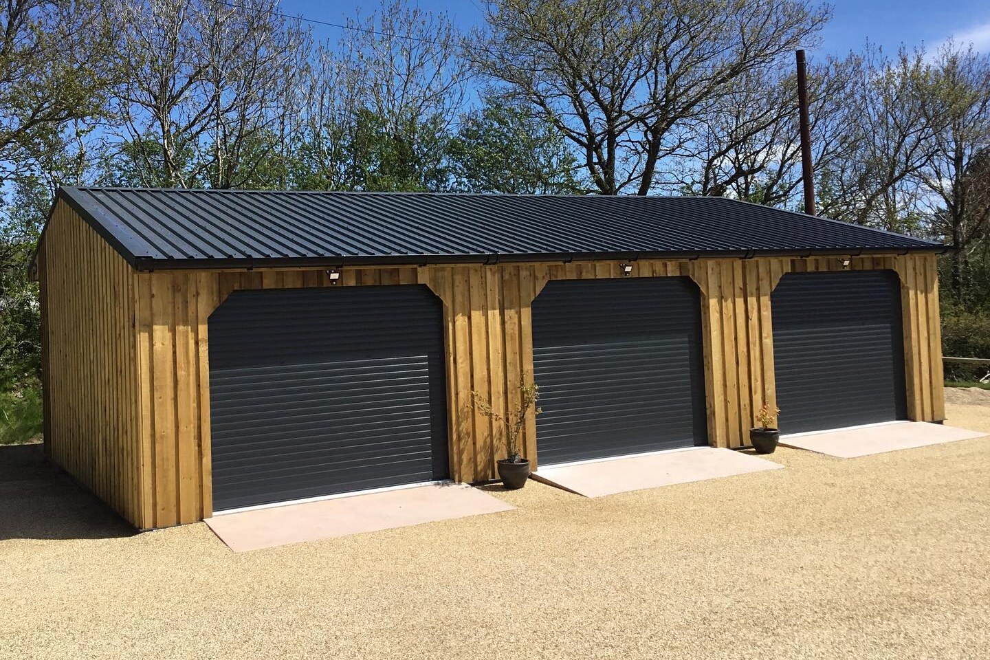 3bay garage with roller doors